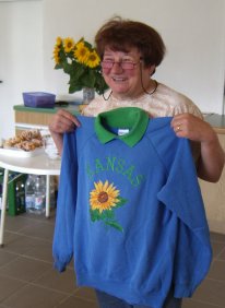 Frau Kraft with sweatshirt from earlier Kansas visitor